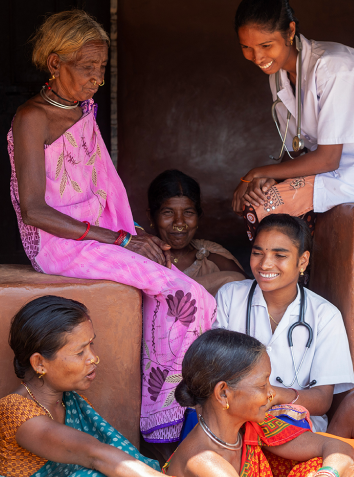 Health worker interacting with families